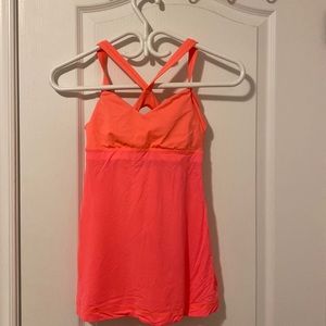 Pink/ coral lulu lean on tank top. Size 2.